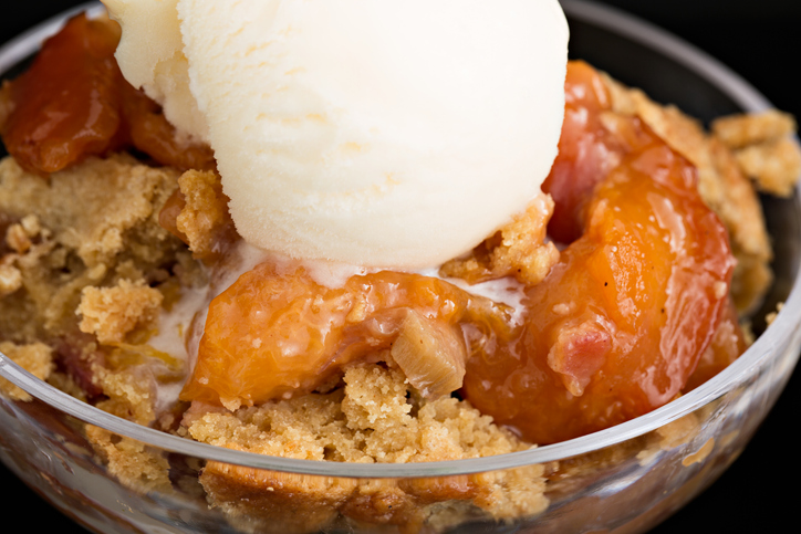 Serving Of Peach Cobbler And Ice Cream