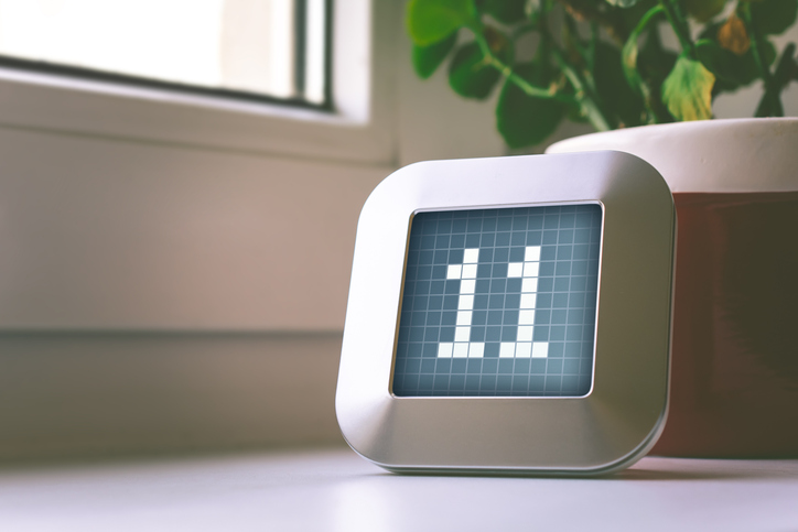 What Is The Spiritual and Biblical Meaning of 11 - Close-Up Of Number On Digital Display At Table